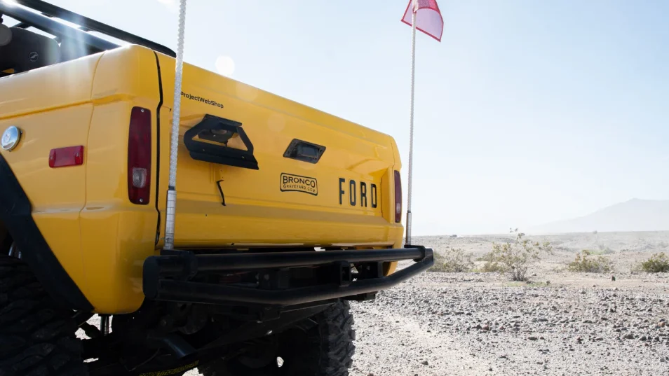 Tailgate view of Dana Nevins Yellow 1970 Ford Bronco