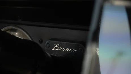 Bronco logo view of Dana Nevins Yellow 1970 Ford Bronco