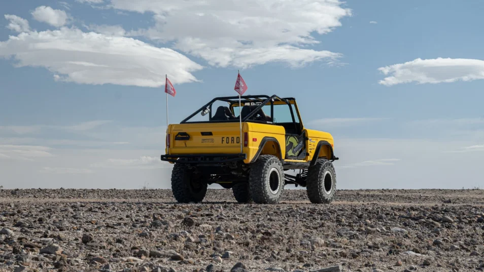 back 3/4 view of Dana Nevins Yellow 1970 Ford Bronco