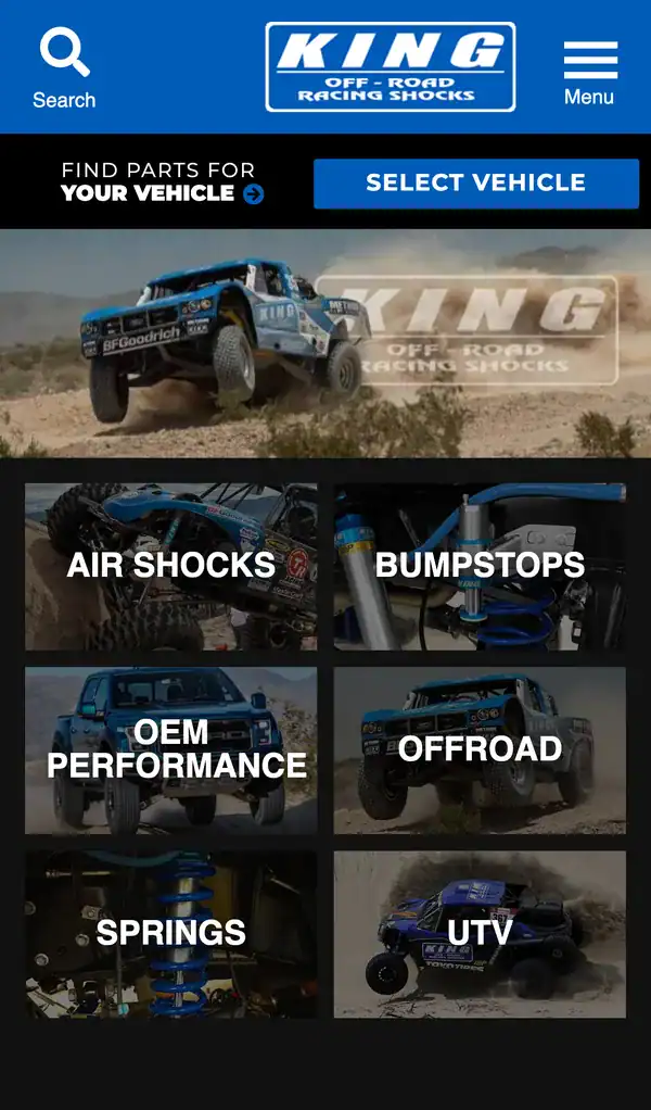 King Shocks store on a phone with search, a Select Vehicle button and category tiles
