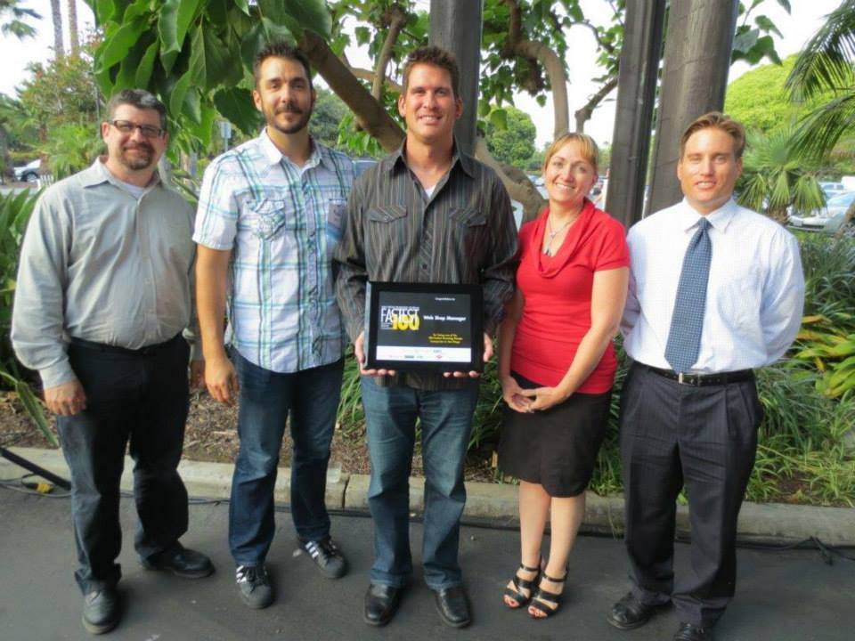 Web Shop Manager directors celebrating 2013 Fastest Growing Private Companies award